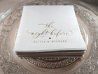 Stack of napkins with 'the night before' and names printed on a decorative plate.