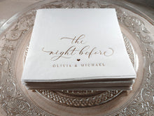 Stack of napkins with 'the night before' and names printed on a decorative plate.