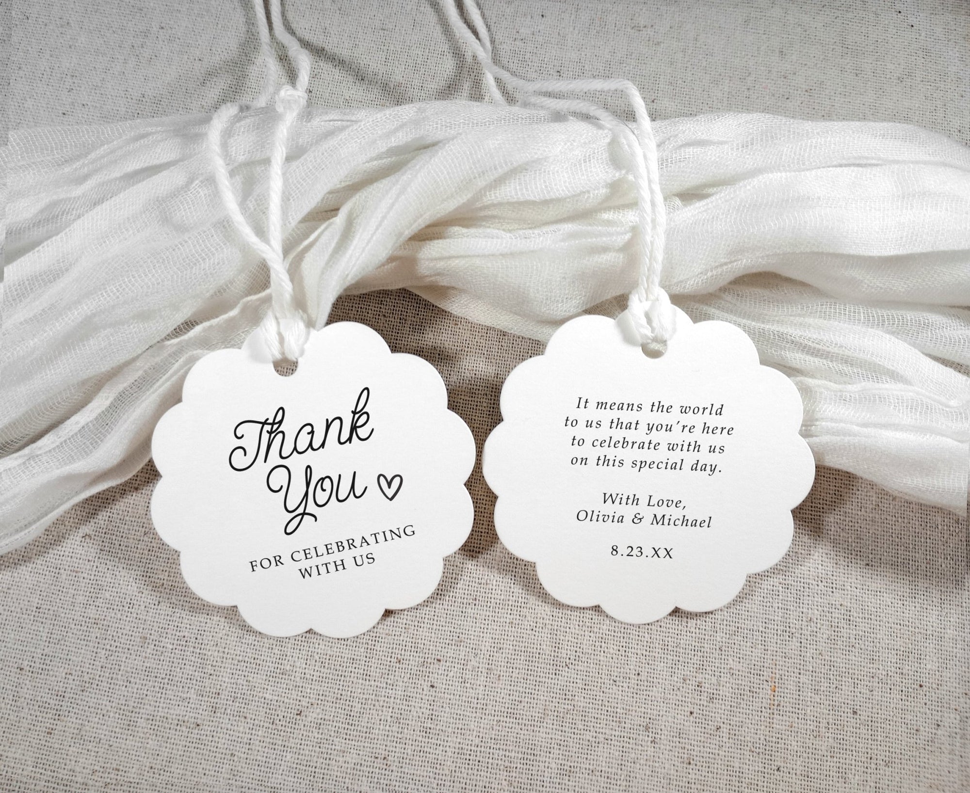 front and back view of scalloped round favor tags in fun script