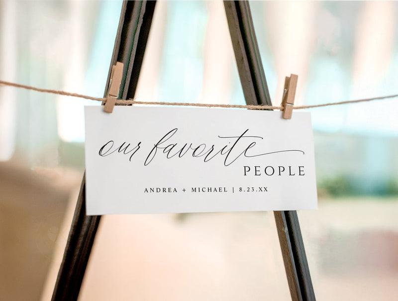 “Our Favorite People” wedding seating chart header card with elegant calligraphy script