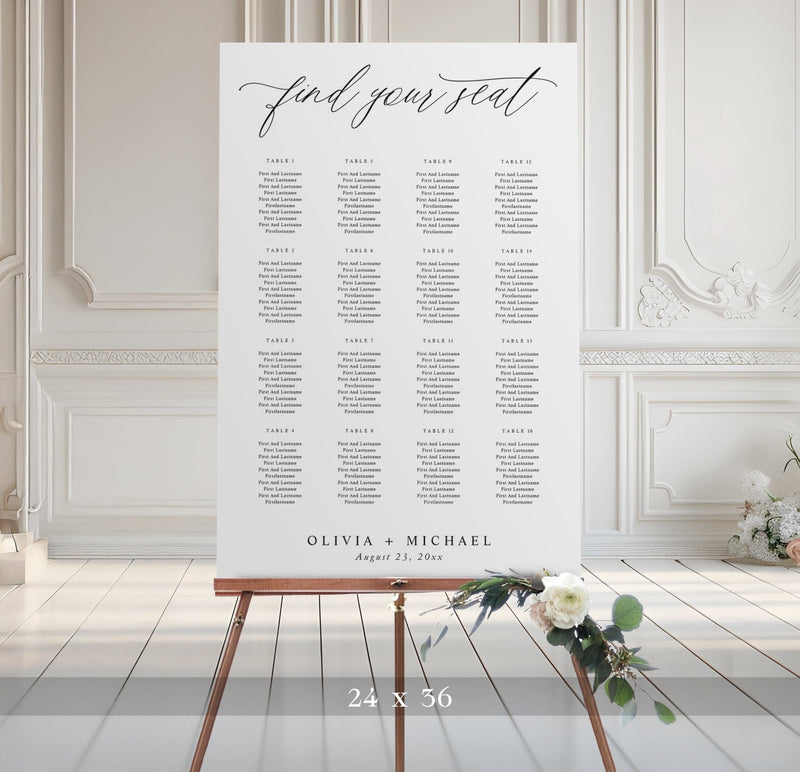 Seating chart for a wedding on an easel with decorative flowers in a elegant room.