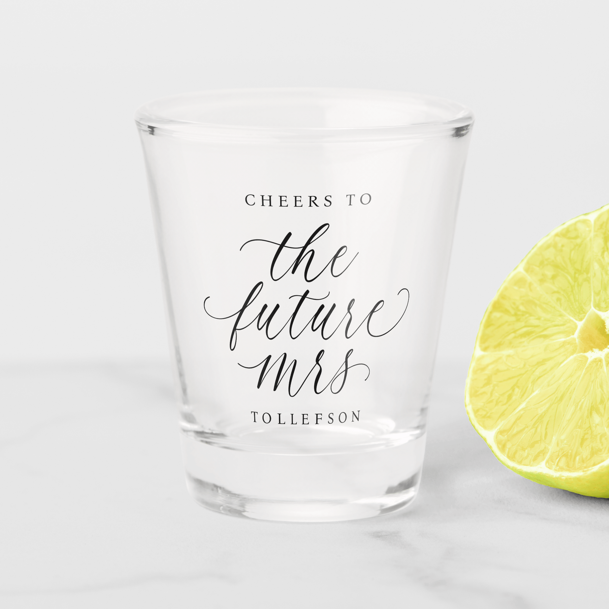 Elegant black and white bridal shower shot glass with “the future mrs” in calligraphy script.