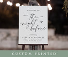 Custom printed sign on an easel with decorative lights in the background