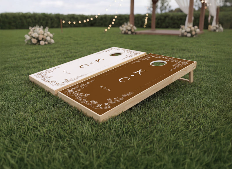 Brown vintage French floral wedding reception cornhole boards with initials