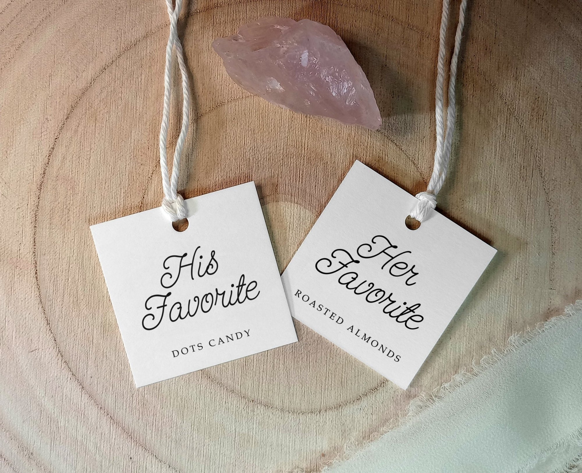 Two hanging tags on a wooden surface, one labeled 'His Favorite' and the other 'Her Favorite'.