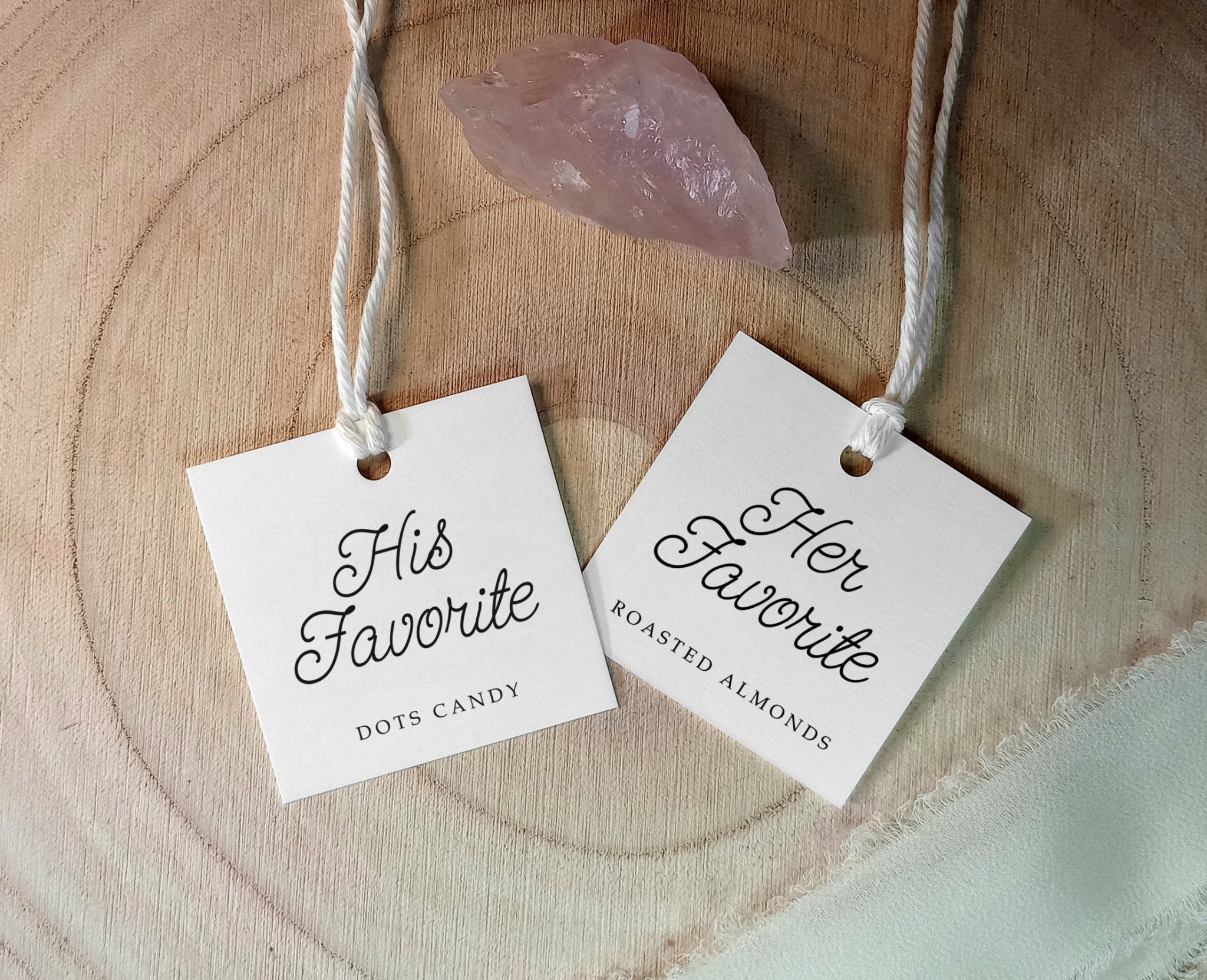 Two hanging tags on a wooden surface, one labeled 'His Favorite' and the other 'Her Favorite'.