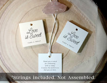 Three 'Love is Sweet' treat tags on a wooden surface with text indicating strings included but not assembled.