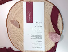 Reception place setting featuring slim name tag and menu card, styled with ribbon accent.