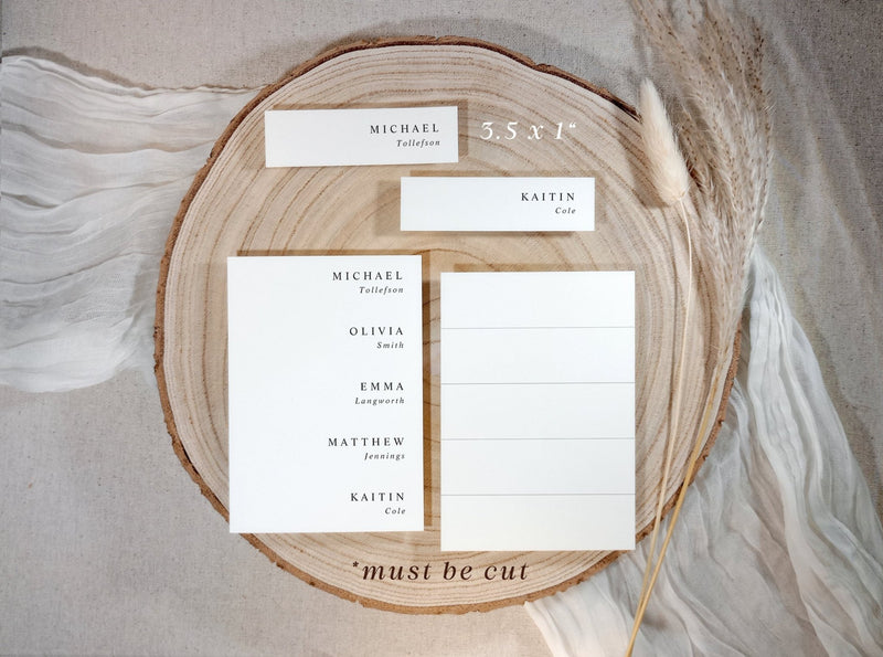 Set of name cards on a wooden board with a neutral background