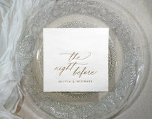 Stack of custom foil-stamped napkins in gold, silver, and rose gold, showcasing elegant rehearsal dinner designs.
