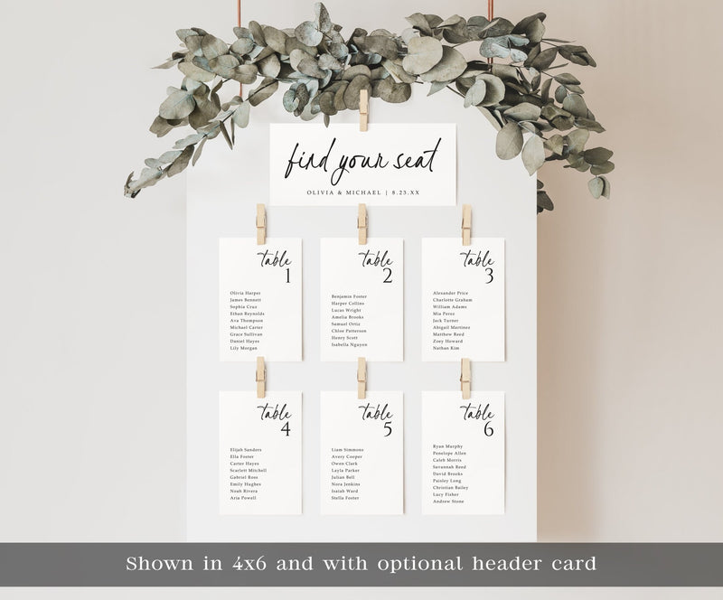 Custom printed wedding table seating chart cards displayed with greenery, featuring simple handwriting script and optional header card.