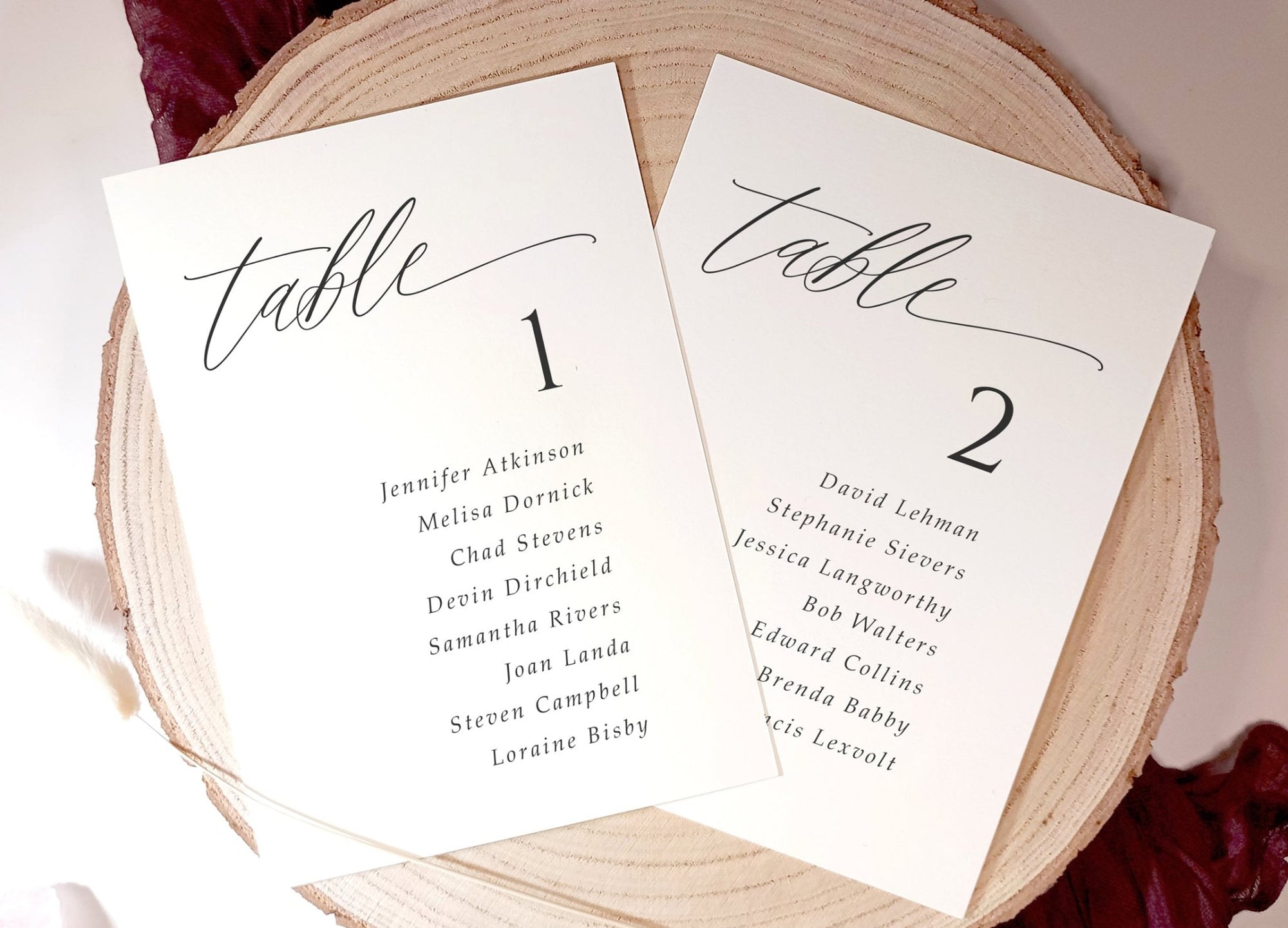 Close-up of calligraphy table card in 5x7 size, displayed on textured backdrop.