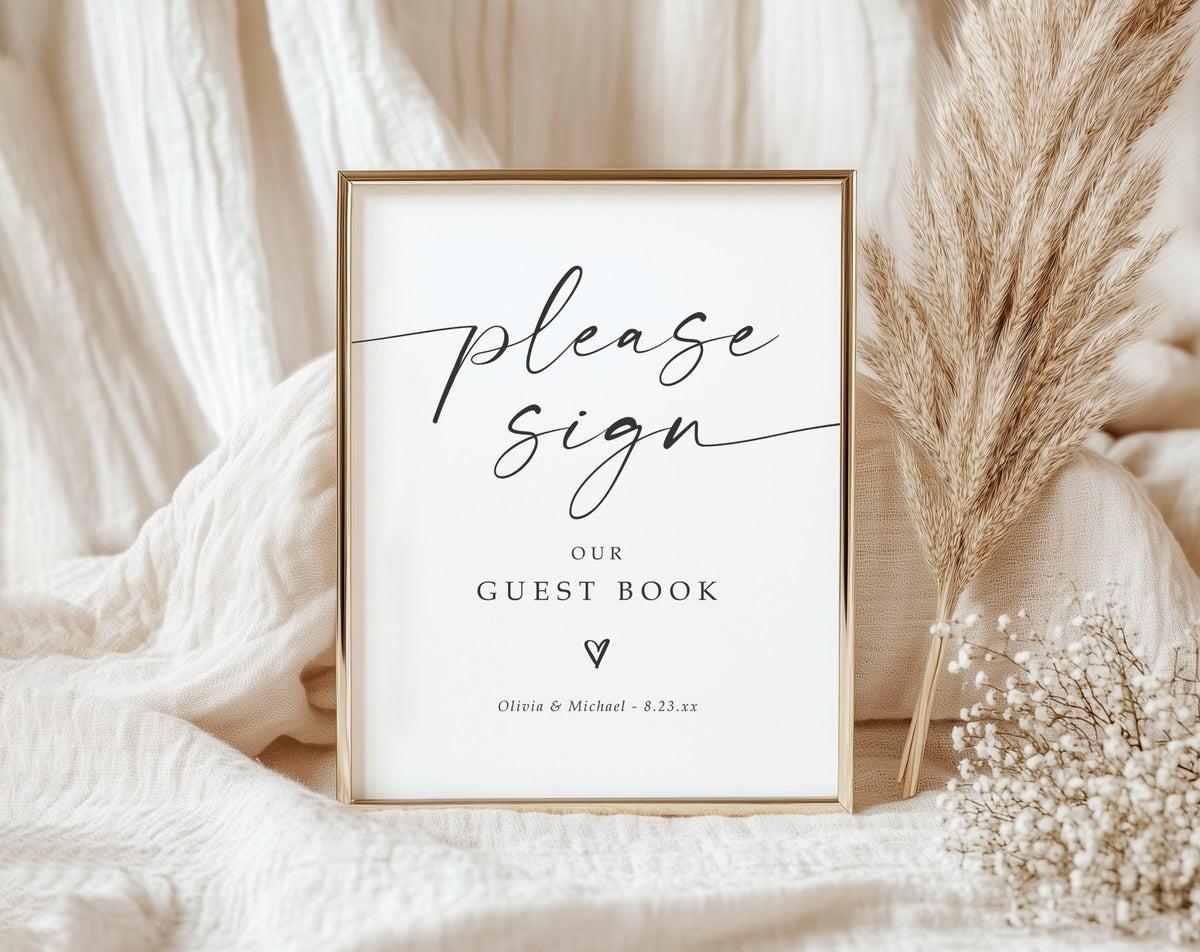 Modern black and white wedding guest book sign with minimalist handwritten typography