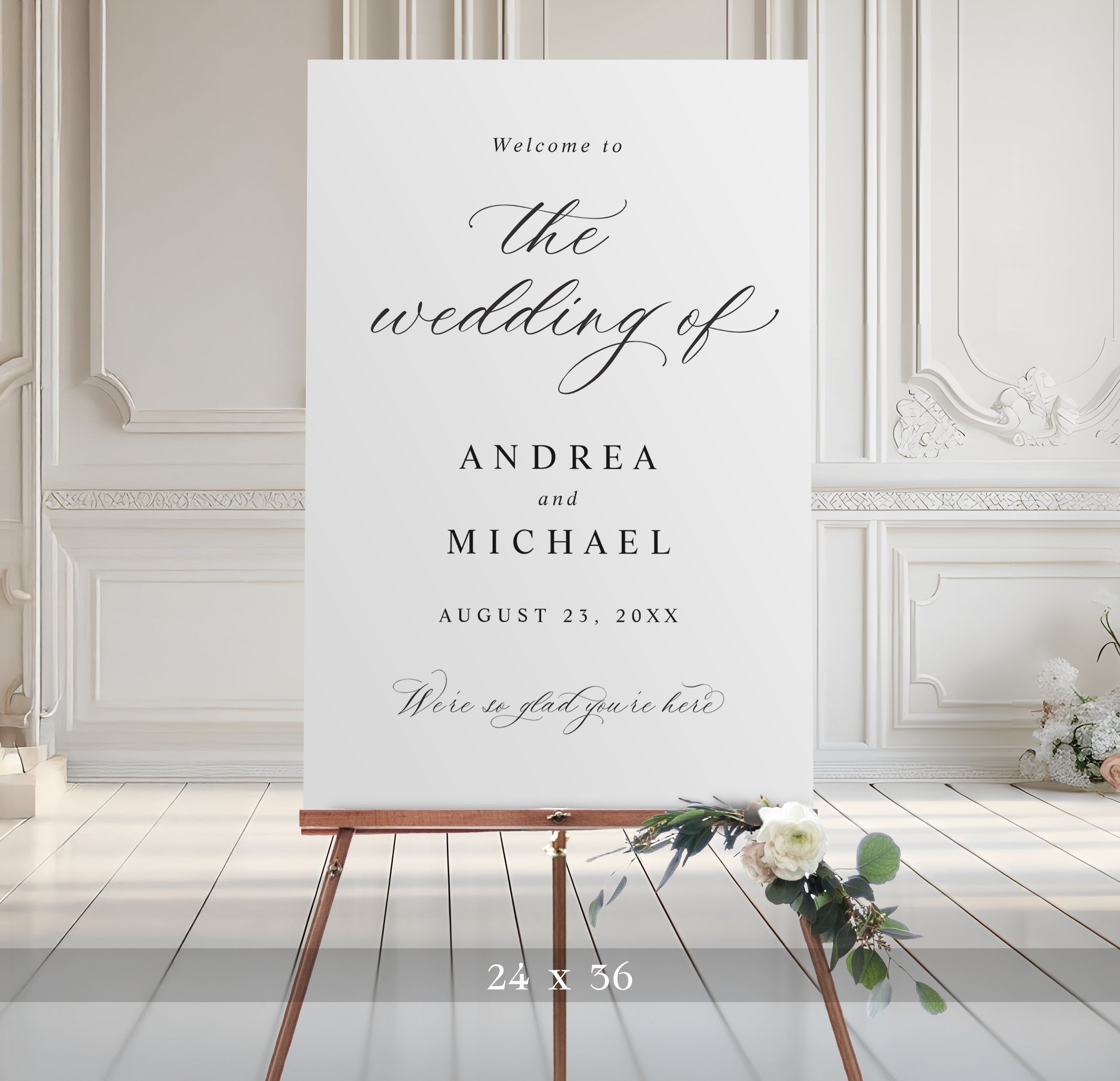 Wedding welcome sign on an easel with floral decorations in a elegant room.