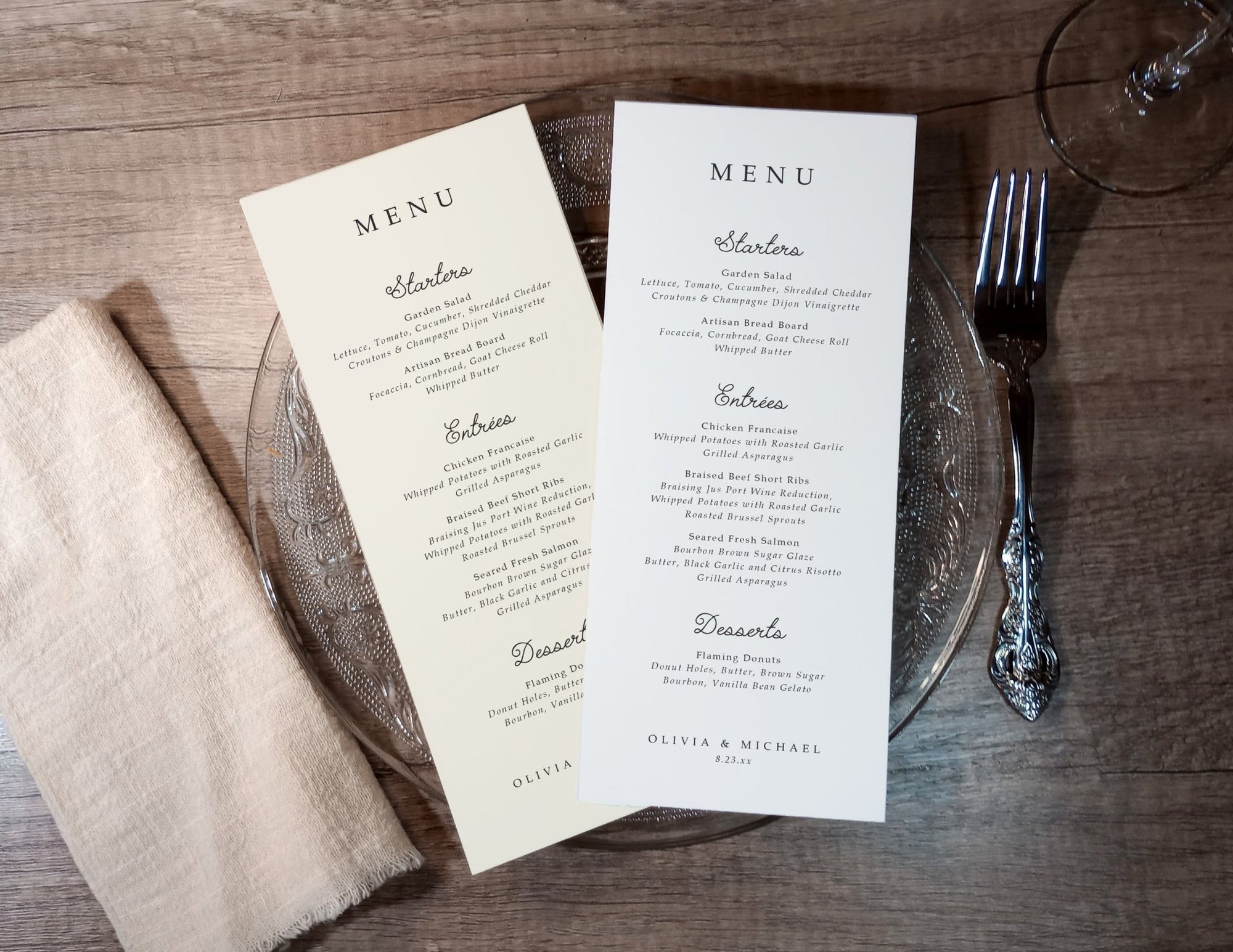 Two whimsical handwritten menus laid out on a neutral table setting.