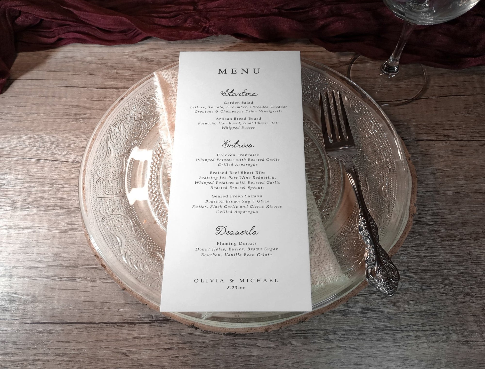 Menu with modern serif and handwriting details styled with flatware and napkin.
